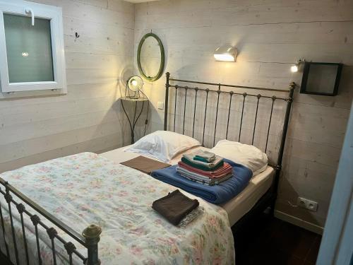 Ένα ή περισσότερα κρεβάτια σε δωμάτιο στο Maisonnette 40