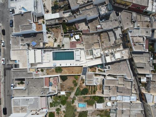 an aerial view of a city with buildings at Appartamento Trifoglio TS Residence in Sannicola