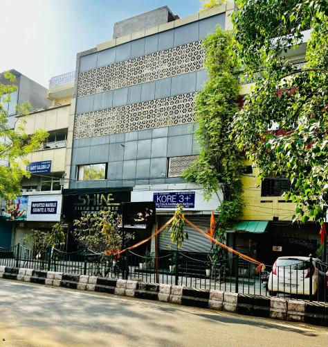 a building on the side of a street at Divine Inn Hotel Near Rajouri Garden Main Market in New Delhi