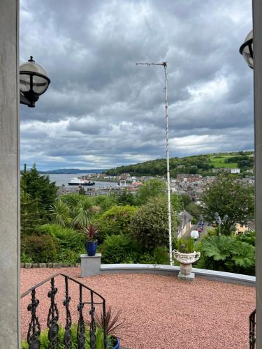 a balcony with a view of a city at Ivybank Villa in Rothesay