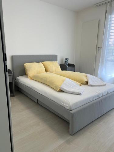Postel nebo postele na pokoji v ubytování Apartment TOM