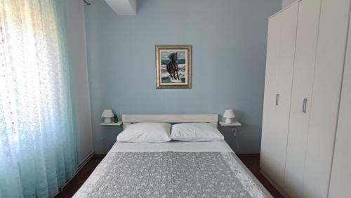 Postel nebo postele na pokoji v ubytování Apartment Olea