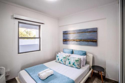 Cama o camas de una habitación en Tropical Beachfront Escape