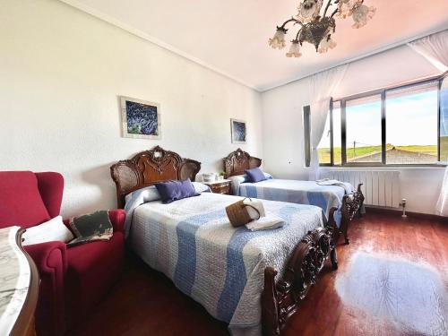 a bedroom with two beds and a couch at El Trocador - 12805 in Ajo