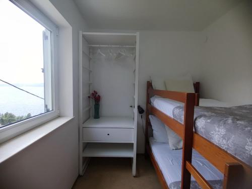 Katil atau katil-katil dalam bilik di Apartments Ivančić