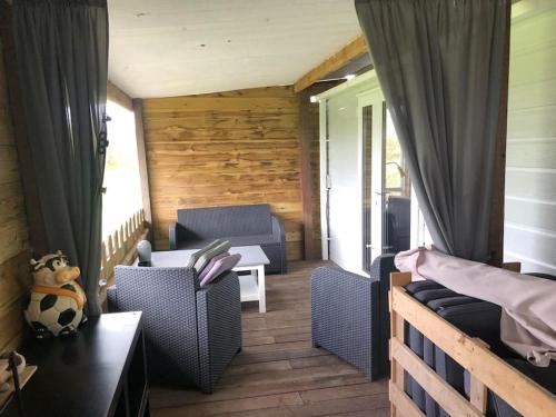 Χώρος καθιστικού στο Chalet dijkzicht