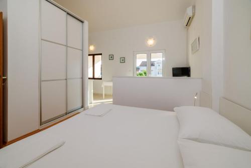 Katil atau katil-katil dalam bilik di Apartments Biserka