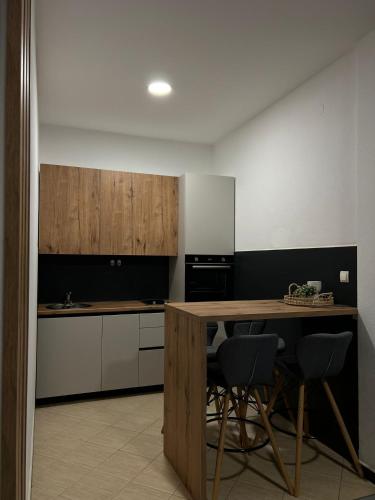 Kuchyň nebo kuchyňský kout v ubytování Apartments Aureus