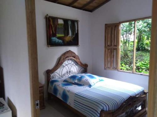 Postel nebo postele na pokoji v ubytování FINCA HOTEL Los AZAHARES