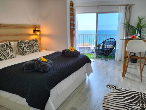 Postel nebo postele na pokoji v ubytování Playa Monis 2