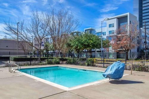 a swimming pool with a blue tarp around it at Extended Stay America Suites - Houston - Westchase - Westheimer in Houston