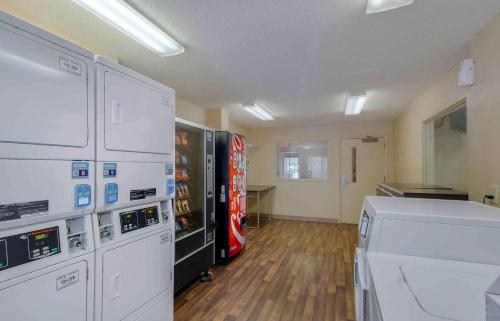 a room with two arcade machines and a video game at Extended Stay America Select Suites - Atlanta - Vinings in Atlanta