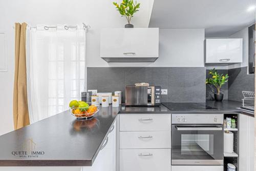 Kuchyň nebo kuchyňský kout v ubytování Maison Rénovée Calme & Confort à 20 min de Monaco