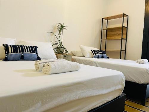 Ένα ή περισσότερα κρεβάτια σε δωμάτιο στο Hostal 1545