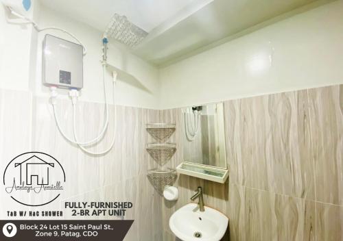 Amplayo Apartelle 2-BR Unit tesisinde bir banyo