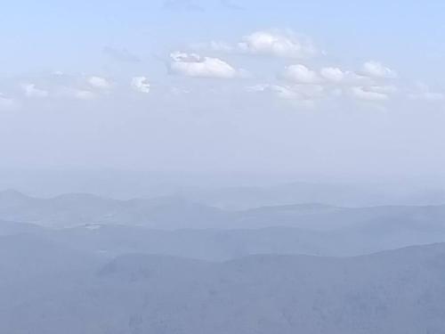 a group of white clouds in the sky at The Cabin Barrington Tops Your Eco Place in Nature in Chichester