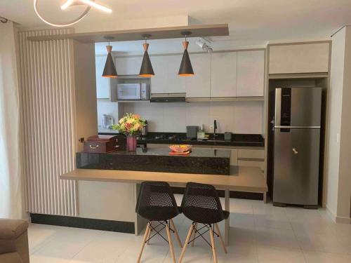 Küche/Küchenzeile in der Unterkunft Condomínio pé na areia com lazer completo - PCD