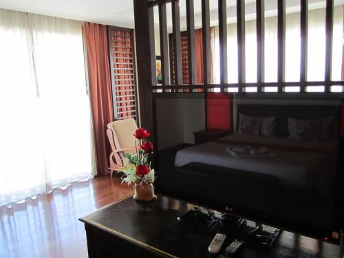 Ein Bett oder Betten in einem Zimmer der Unterkunft Wannara Hotel Hua Hin