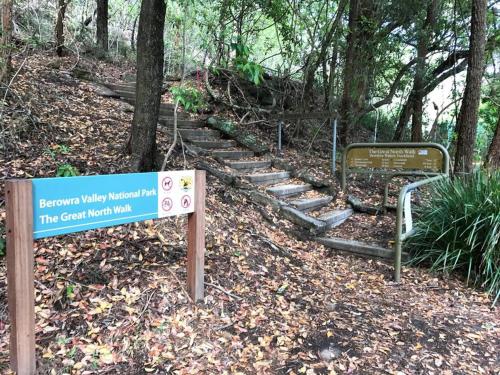a sign for the great north trail in the woods at NINE at Berowra Waters, luxury waterfront with hot tub in Berrilee