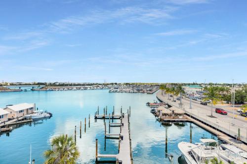 a view of a marina with boats and a dock at St Kitts - Downtown Waterfront Penthouse Pool Dock Parking in Key West