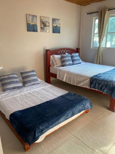 Postel nebo postele na pokoji v ubytování Sirena azul