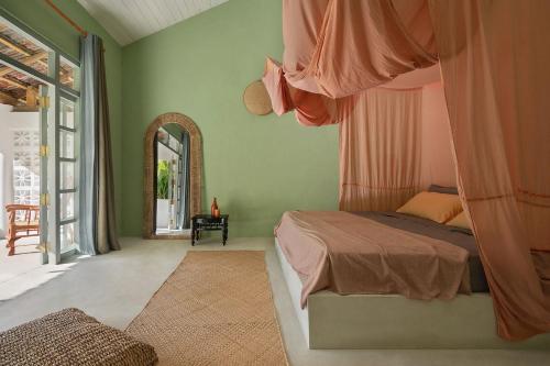 Postel nebo postele na pokoji v ubytování Casa Tikiri - BOUTIQUE HOTEL Adults-Only