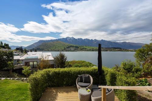 a house with a view of a lake and mountains at Amazing Lake Views in Queenstown