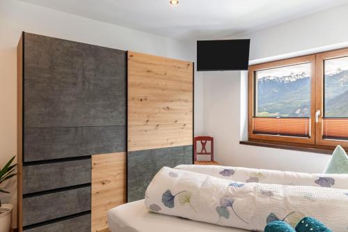 Una cama o camas en una habitación de Apart Elias