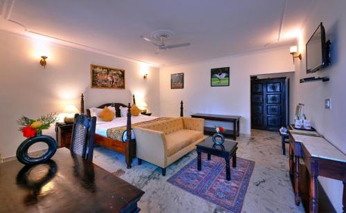 Postel nebo postele na pokoji v ubytování Tiger Den Resort