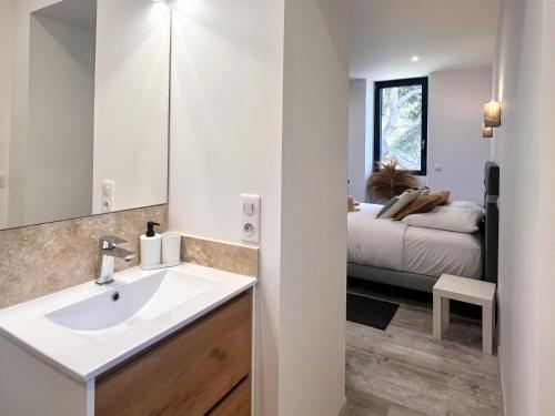 Ένα ή περισσότερα κρεβάτια σε δωμάτιο στο Villa du Tallagard