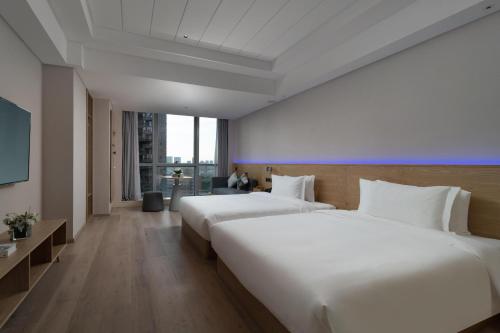 Foto dalla galleria di Westlake Art Hotel -Xiasha University Town Branch a Hangzhou