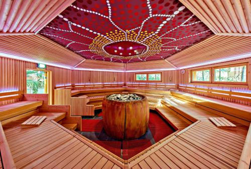 a bowling alley with a large barrel in the middle at Tropical Islands in Krausnick