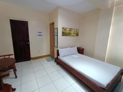 Postel nebo postele na pokoji v ubytování DISADECO Hostel
