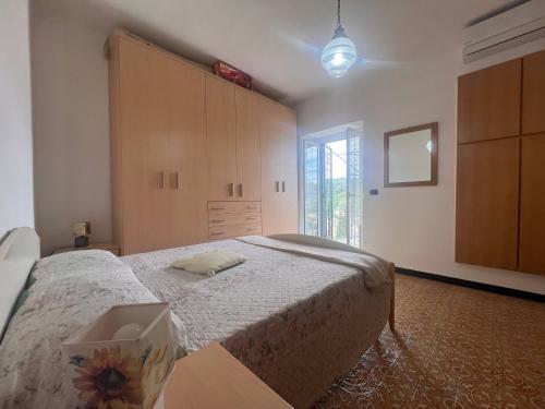 a bedroom with a bed with a box on it at Casa del Menegotto in Rapallo
