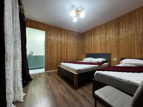 Postel nebo postele na pokoji v ubytování Guest House Leon