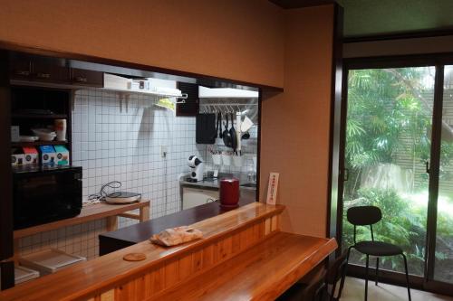 Guest House BONITOにあるキッチンまたは簡易キッチン