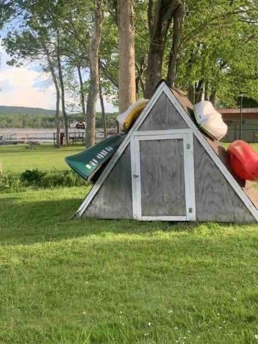 a small tent in the grass in a field at Serenity on Lamoka in Hammondsport