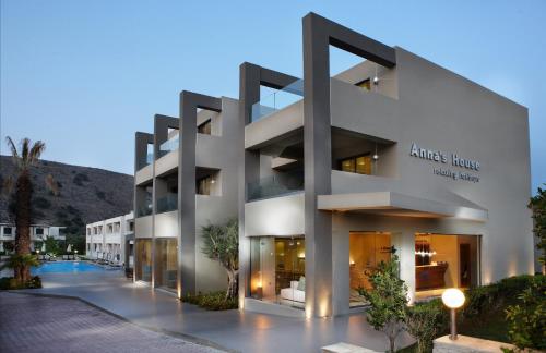 a rendering of an apartment building at dusk at Anna's House in Georgioupolis