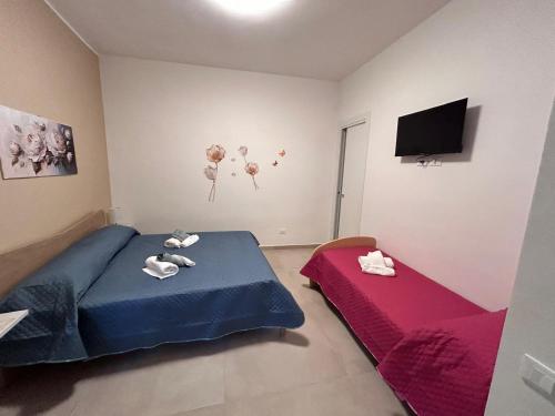 Ένα ή περισσότερα κρεβάτια σε δωμάτιο στο casa johrico