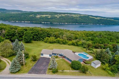 an aerial view of a house with a swimming pool at Keuka Glory in Hammondsport