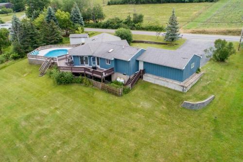 an aerial view of a house with a swimming pool at Keuka Glory in Hammondsport
