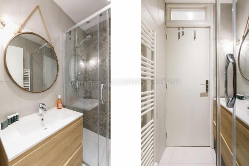 une salle de bain avec une douche, un lavabo et un miroir dans l'établissement Bronze, à Cannes