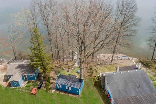an aerial view of a house with a tree at Camp Waneta in Hammondsport