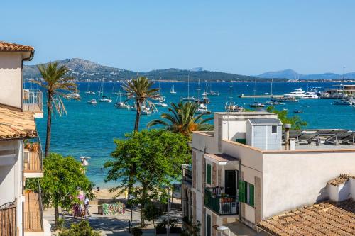 a view of a harbor with boats in the water at Can Fiol ii in Port de Pollensa