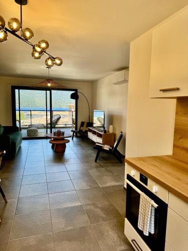 Kuchyň nebo kuchyňský kout v ubytování Appartement confort vue mer