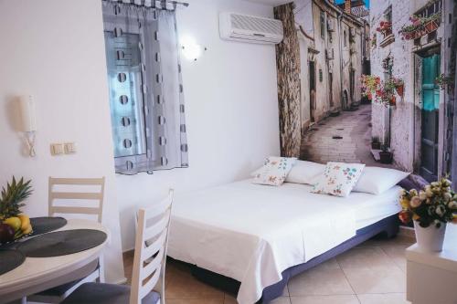 Un pat sau paturi într-o cameră la Vila Promajna 3