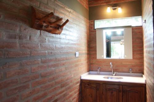 Koupelna v ubytování Cabañas por día en Valle Hermoso Sierras de Córdoba