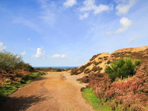 a dirt road in the middle of a mountain at Nebo Pod in Bodewryd