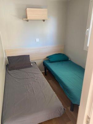 Postel nebo postele na pokoji v ubytování camping la marina