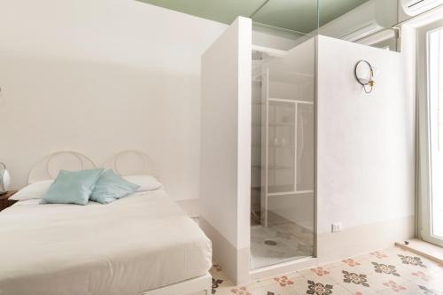 Ένα ή περισσότερα κρεβάτια σε δωμάτιο στο Fico! Apartments by MONHOLIDAY
